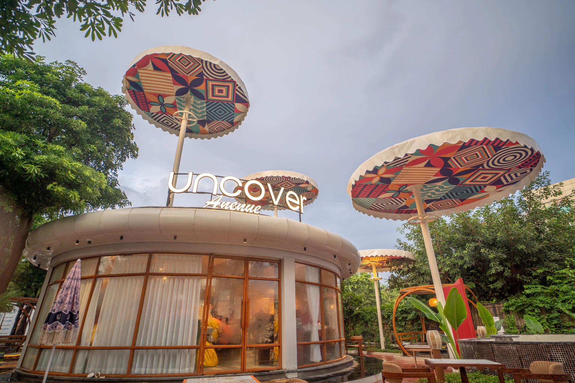 Uncover Avenue pavilion and colourful garden umbrellas