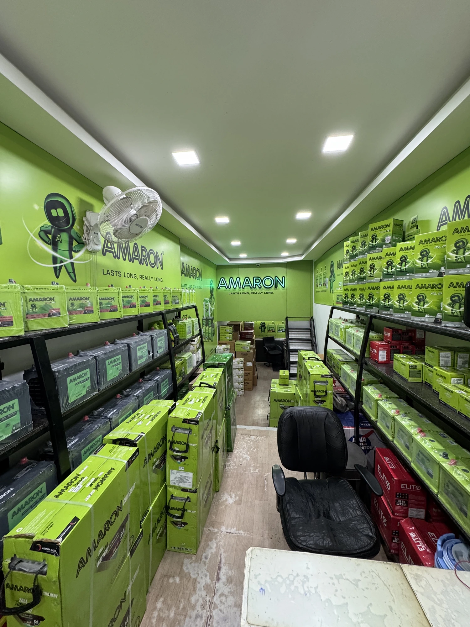 Amaron battery display shelves — inside the store