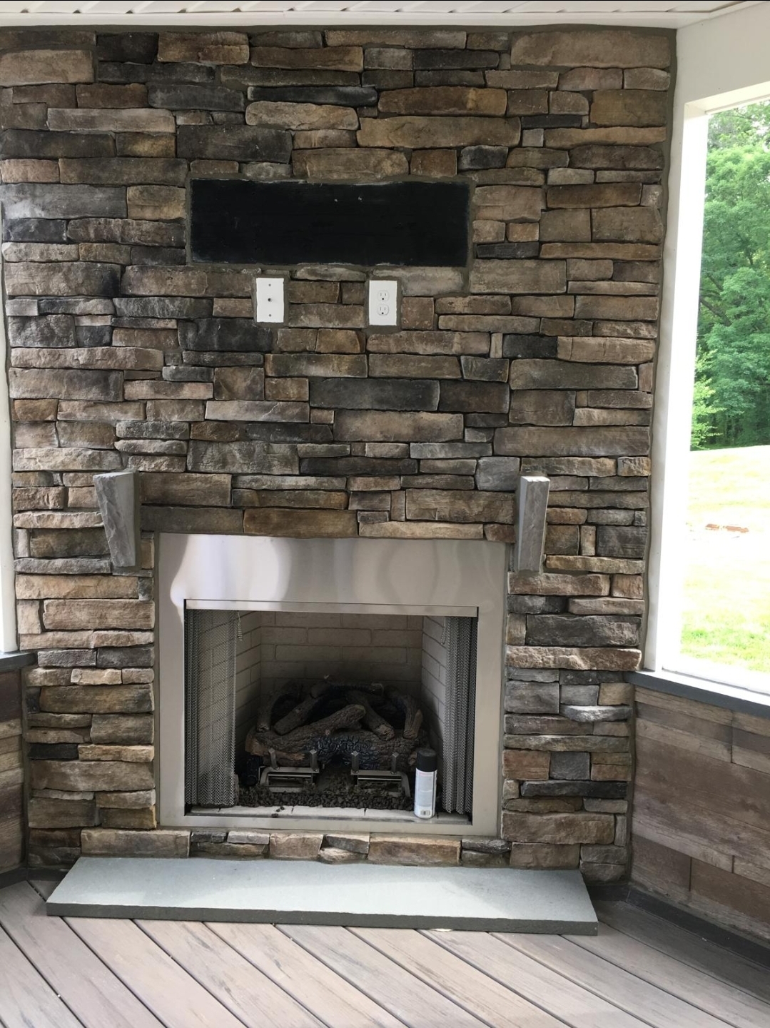 Stacked stone fireplace wall