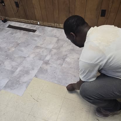 Laying the new floor by hand