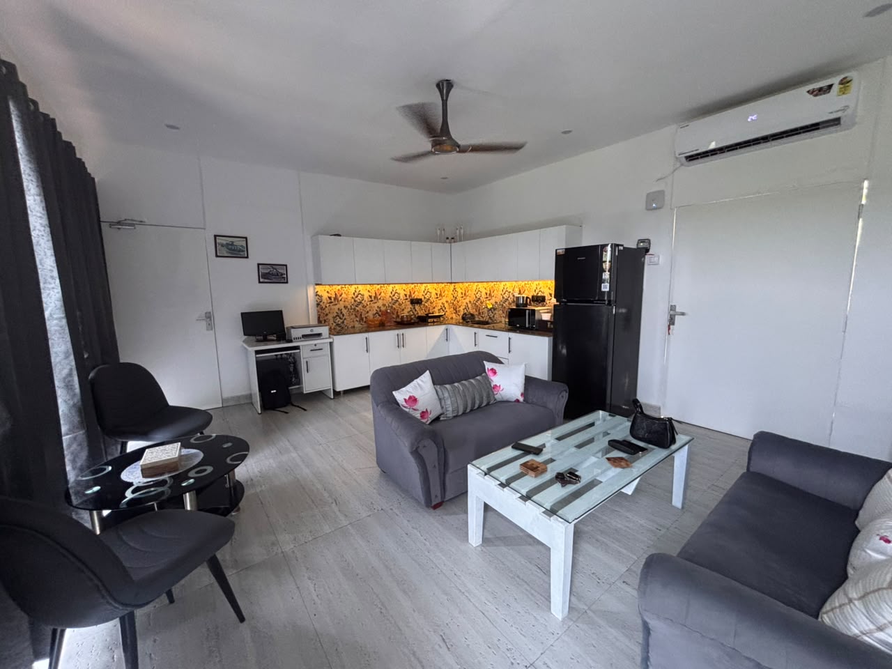 Sample cottage living room and kitchen interior