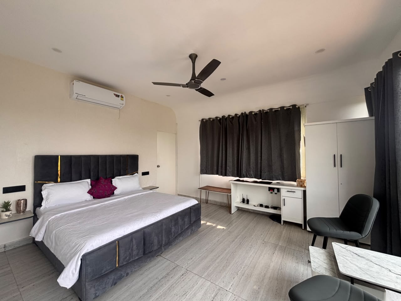 Sample cottage bedroom interior with modern furnishings