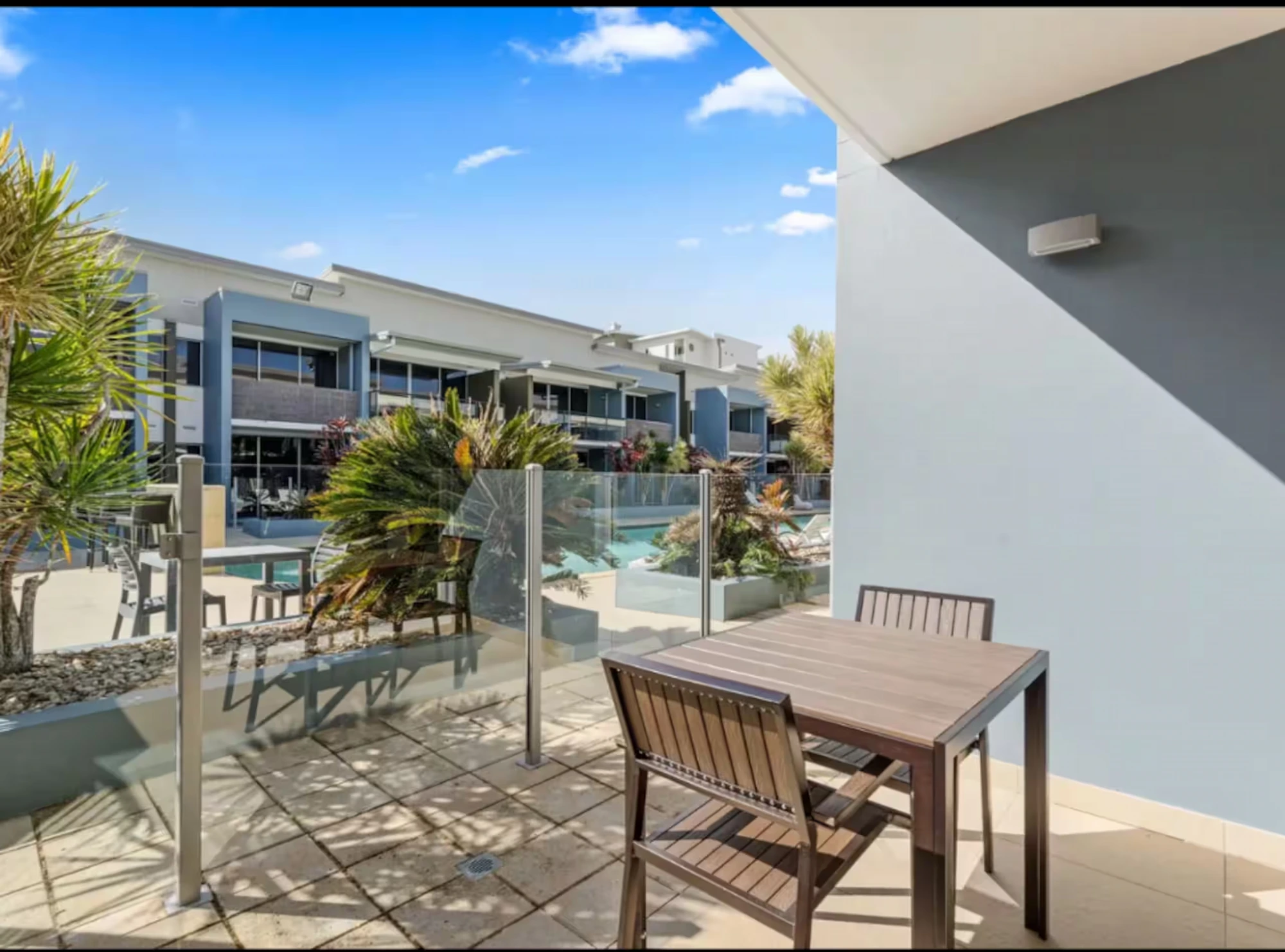 Patio and pool access at Bahloo, Ramada Resort Urangan, Hervey Bay