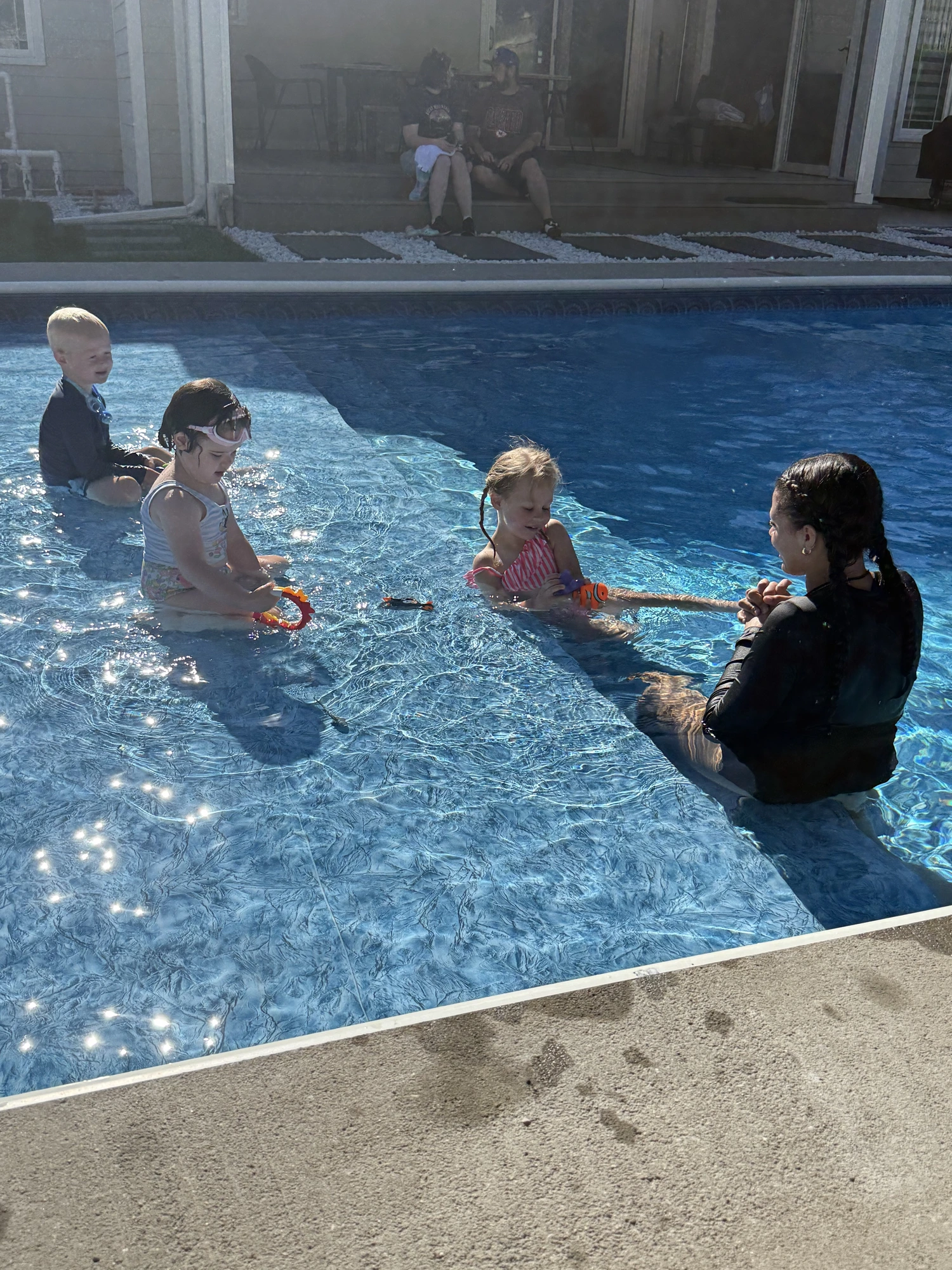 Golden hour giggles in the sunlit pool